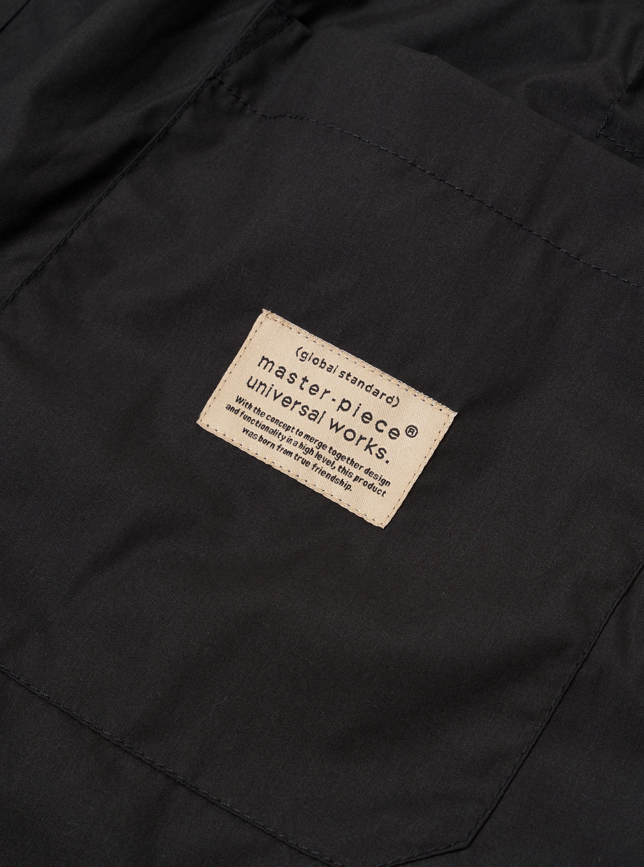 master-piece x Universal Works Black Recycled Poly Tech Pleated Track Short - Image 7