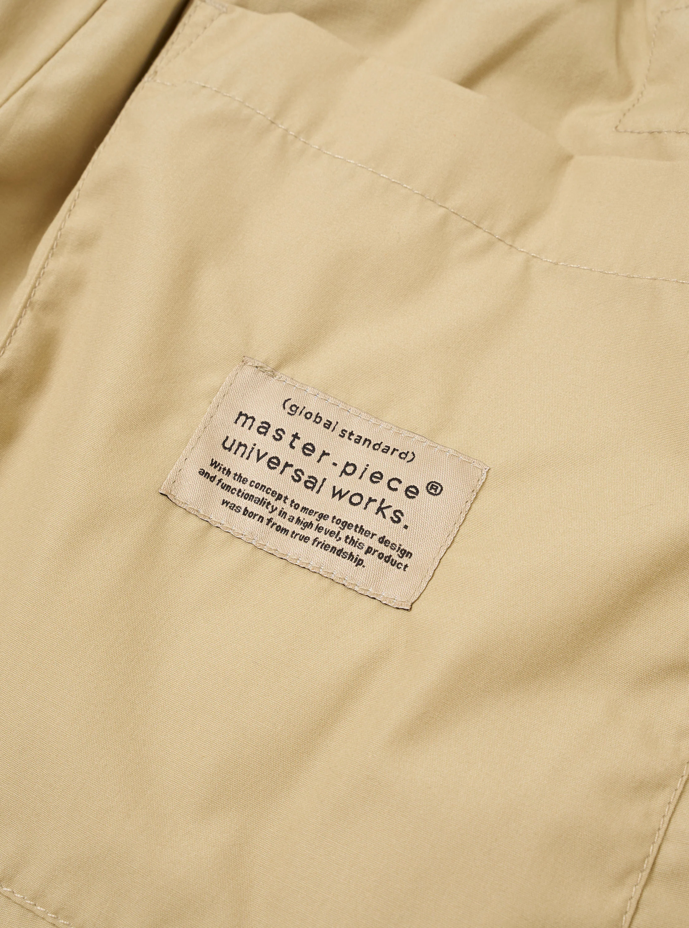 master-piece x Universal Works Sand Recycled Poly Tech Pleated Track Short - Image 7